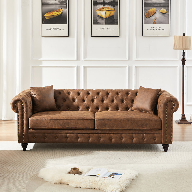 Canapé 3 places de 217 cm (85,5 po) en tissu technique avec accoudoirs arrondis et capitonnage à boutons, idéal pour le salon ou le bureau. Coussins confortables en mousse haute densité, structure robuste, 3 sièges, accoudoirs, design élégant, 2 coussins inclus. Convient aux pièces principales.
