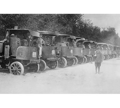 " A Fleet Of Trucks Each With Its Own Driver Is Arrayed "
