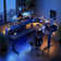 Meachie 63" Adjustable L Shaped Computer Standing Desk with 3 Drawers & Power Outlets & LED Lights