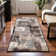 Rotonya Floral Area Rug in Chocolate