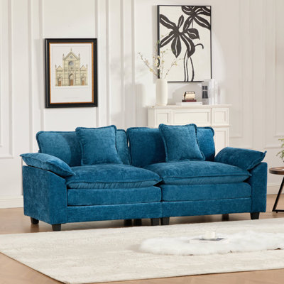 Canapé modulaire rembourré avec accoudoirs et coussins plus larges