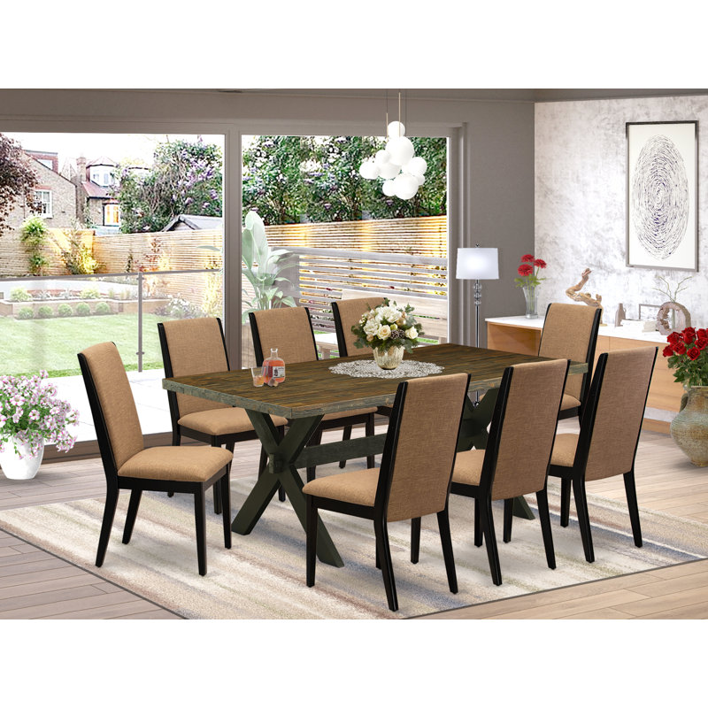 L'ensemble de mobilier de salle à manger 9 pièces comprend une table de salle à manger rectangulaire avec pieds en X et 8 chaises rembourrées en tissu de lin sable clair, noir brossé