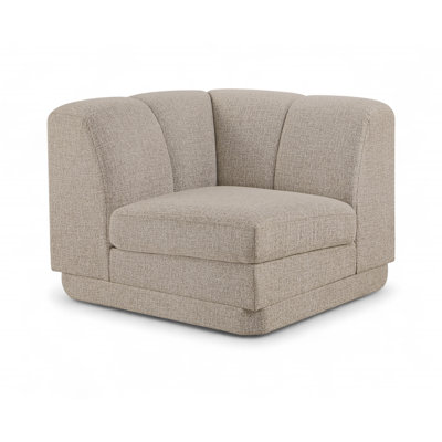 Chaise de coin rembourrée en tissu Chiquita