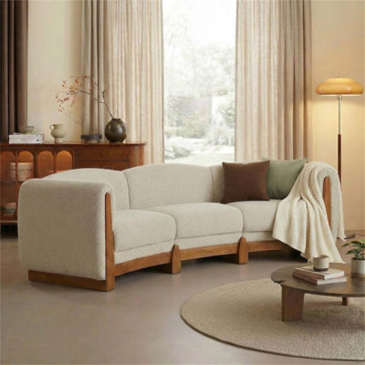 Élégant canapé incurvé avec structure en bois massif, canapé rembourré en tissu avec coussins confortables, canapé d'intérieur moderne pour le salon