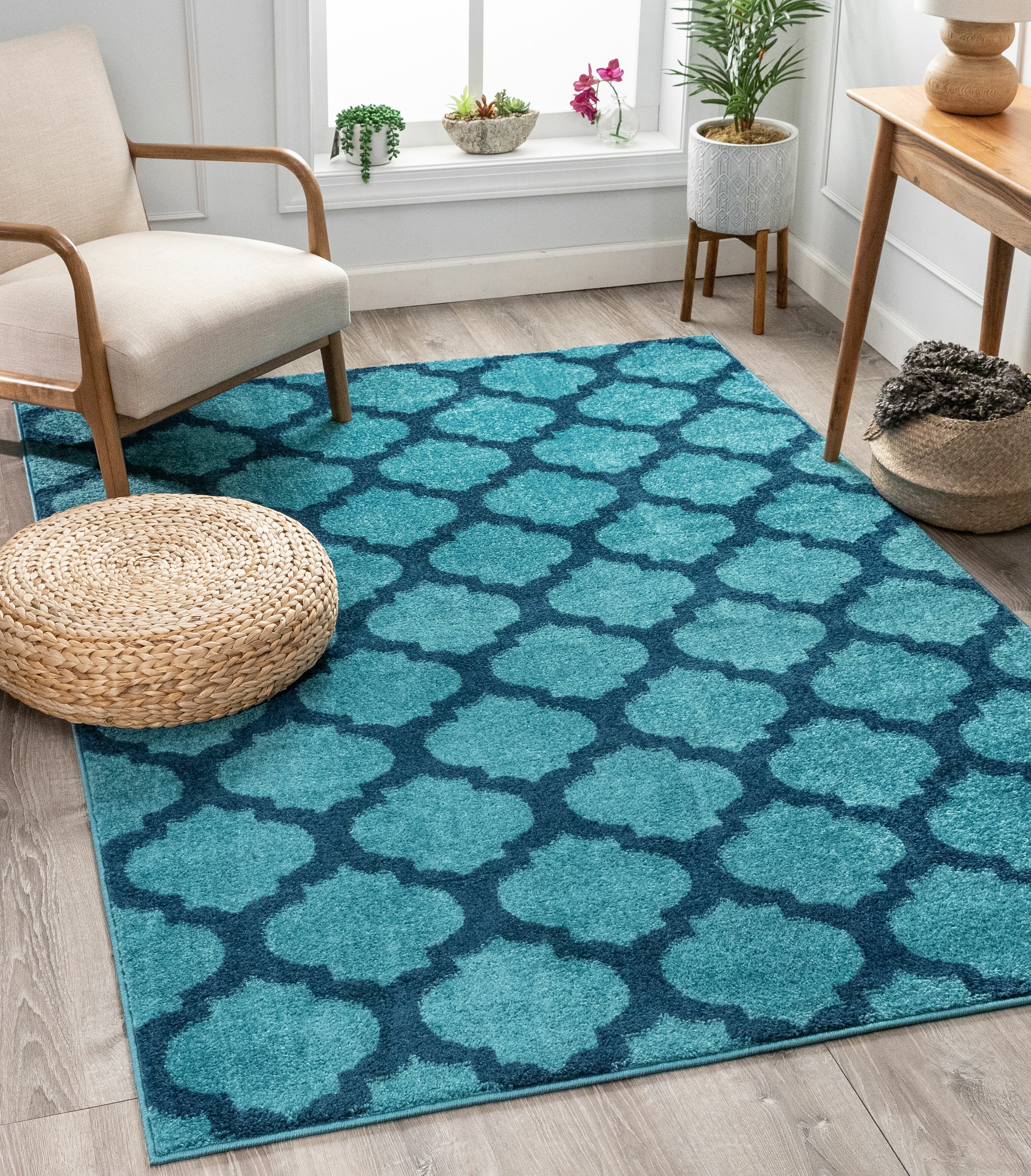 https://assets.wfcdn.com/im/83403922/compr-r85/1006/100683460/rubino-blue-area-rug.jpg