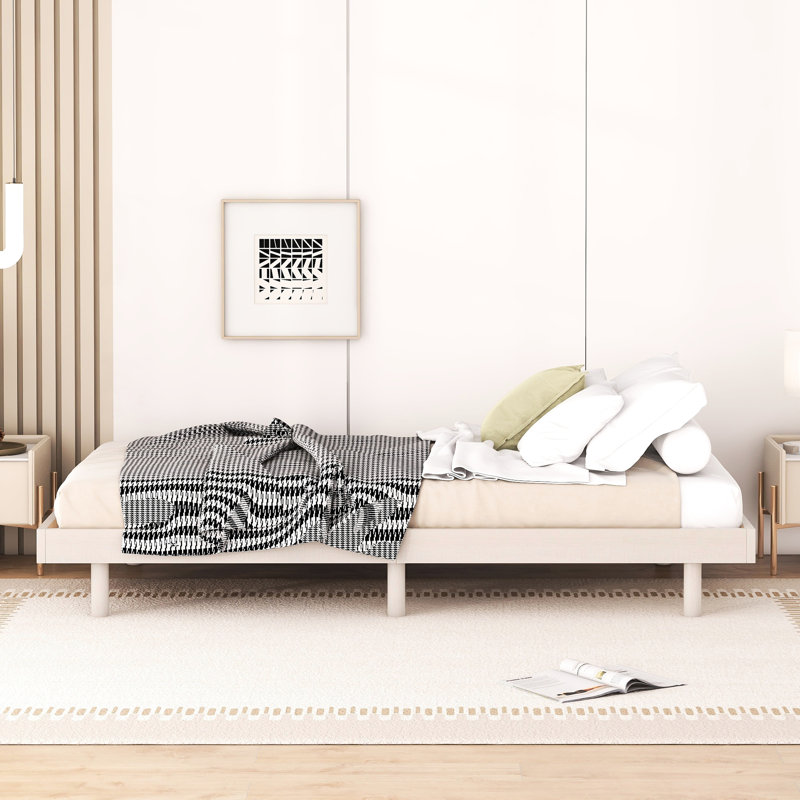 Structure de lit simple moderne blanc délavé - présente une conception flottante pour une plateforme de style améliorée dans un environnement de chambre à coucher stable et élégant