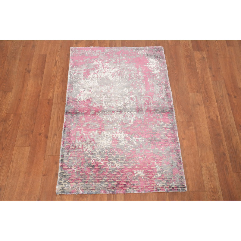 Charmant tapis abstrait rose 2x3 ajoute une touche d'élégance