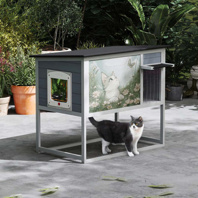 Weatherproof Outdoor Cat House, Elevated Feral Cat Shelter with High Legs, Curtained Door, Escape Door, Openable Top, Gray with Patterned Panel