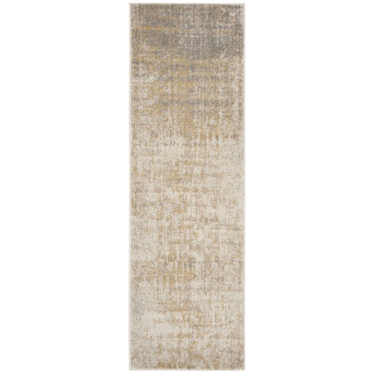 Tapis crème / doré Bethlyn