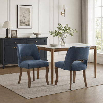 Ensemble de 2 chaises de salle à manger modernes en bois et en tissu, avec design ajouré et dossier incurvé pour un confort d'assise optimal.