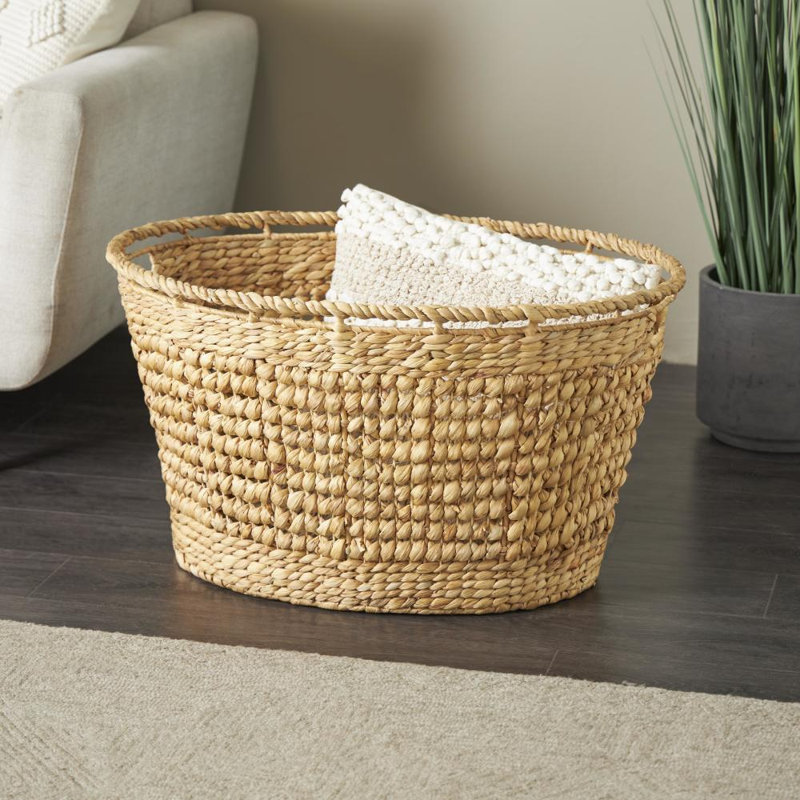 Panier de rangement décoratif et fonctionnel ovale en jonc de mer brun avec bordure surélevée et poignée fendue