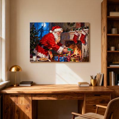 Noël père Noël emballant des cadeaux près de la cheminée