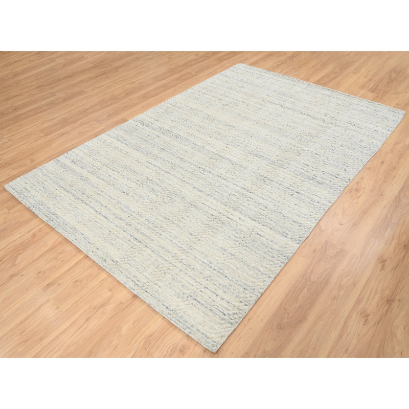 Tapis beige en laine 5 pi 10 po x 9 pi