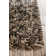 Cyrah Handmade Shag Abstract Black/Brown/Cream Area Rug