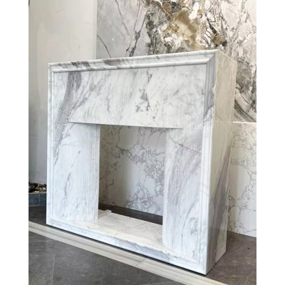 French-style minimalist marble fireplace