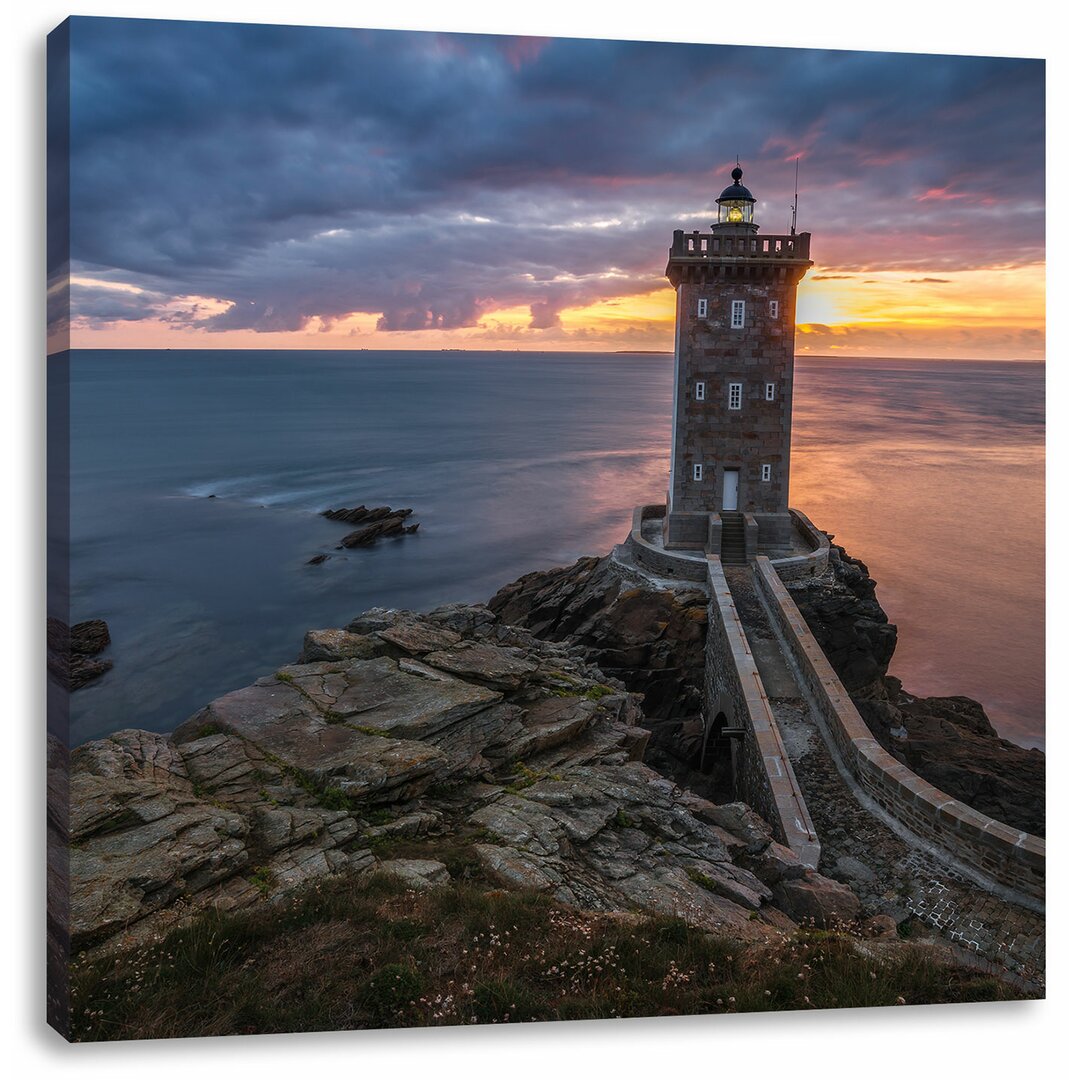 Leinwandbild Leuchtturm im Sonnenuntergang