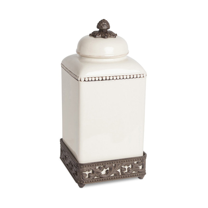 Elegant Cream Ceramic Canister with Ornate Metal Base