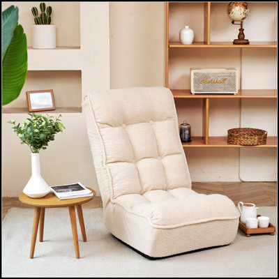 Fauteuil inclinable simple avec dossier réglable pour un confort ultime et un design peu encombrant, pour les salons et les chambres.
