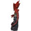 Figurine médiévale dragon rouge sur une tombe gothique cathédrale avec crânes à DEL