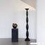 Objet décoratif noir en acier de forme libre en verre