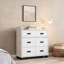 Commode en panneau de particules blanc doux avec 5 tiroirs et plateau spacieux pour l'organisation de la chambre à coucher