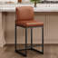 Tabouret de comptoir de cuisine moderne 24 po avec base de traîneau en métal noir et similicuir noir (ensemble de 2)-598470249-600354217-598637964