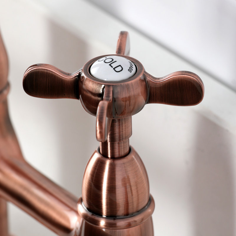 Kingston Brass Bel-Air Two-Handle 4-Hole Deck Mount Bridge Kitchen Faucet with Brass Side Sprayer, Cross, Antique Copper