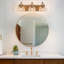 Éclairage pour meuble-lavabo rétro 22,8 pouces à finition laiton à trois lumières 22,8 pouces-124572234-134671675