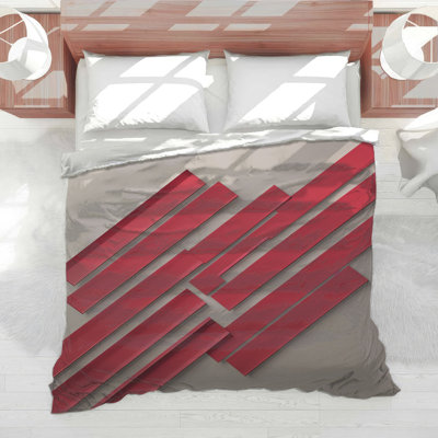 Édredon rouge à lignes géométriques
