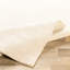 Tapis beige uni noué à la main Masouma-2078235877