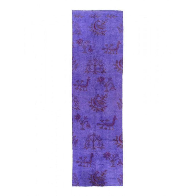 Weda Geometric Area Rug in Purple