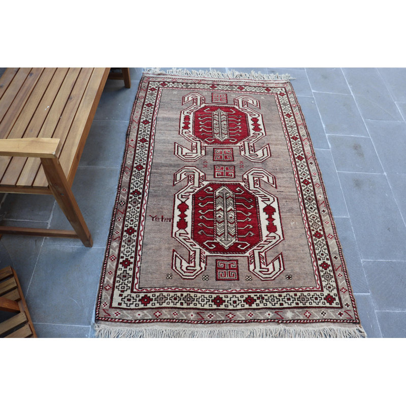 Tapis turc Scorpion tissé à la main dans des motifs géométriques rouges éclatants