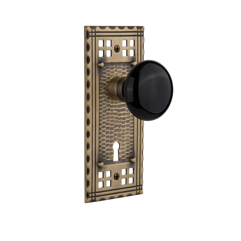 Craftsman Plate with Decorative Keyhole and Black Porcelain Door Knob, Antique Brass
