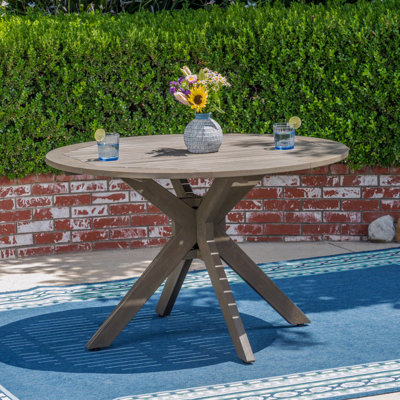 Table de salle à manger de jardin à lattes en X résistante aux intempéries