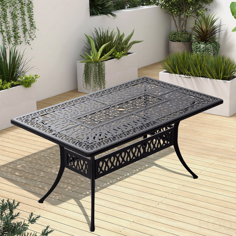 Table de salle à manger en fonte d'aluminium avec structure noire et trou pour parasol