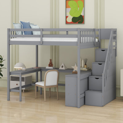 Lit mezzanine avec bureau en L, tablettes de rangement et escalier de rangement attaché