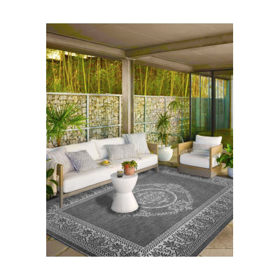 Tapis tissé rond lavable à motif traditionnel