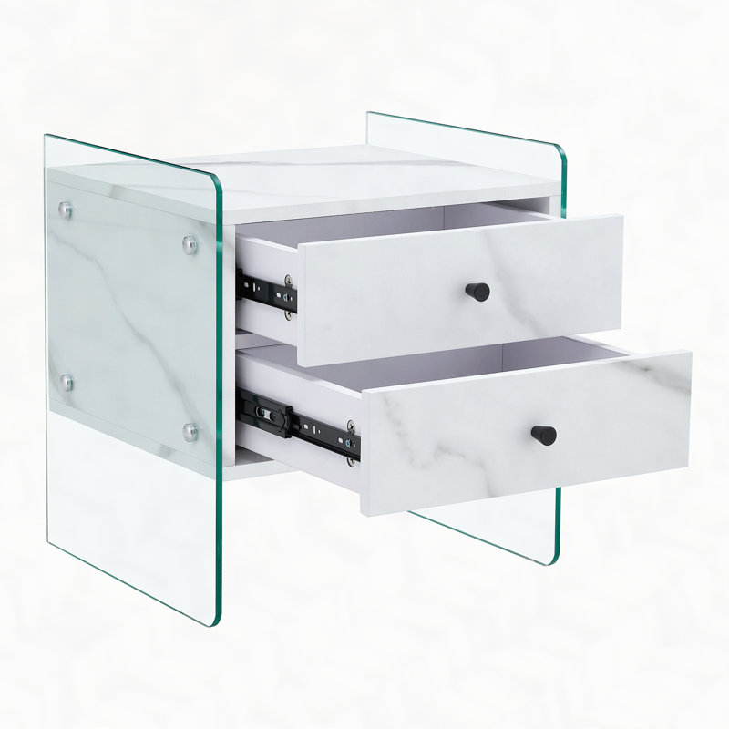 Double-drawer bedside table. The board surface is MDF with grain sticker, and both sides are transparent tempered glass. The design is simple and elegant, with excellent storage functions
