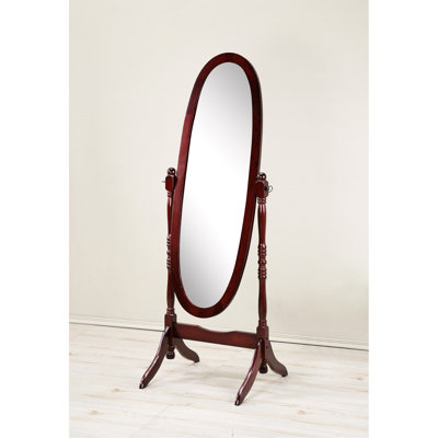Miroir sur pied traditionnel Queen, finition cerisier. Miroir ovale avec reflet. Structure autoportante stable. Dimensions : 40,6 cm (P) x 150,3 cm (H) x 57,2 cm (L). Miroir en bois au fini cerisier. Miroir inclinable. Stabilité assurée.
