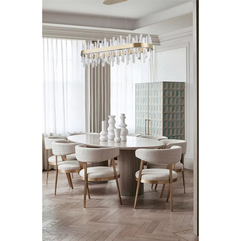 This Exquisite LED Chandelier Is In A Gold Finish. The Frame Is Made Out Of Stainless Steel In An Oval Shape, And The LED Bulbs Are Integrated Into The Frame. It Also Comes With Clear Crystal Accents. The Adjustable Cord Links Make This Fixture Suitable F