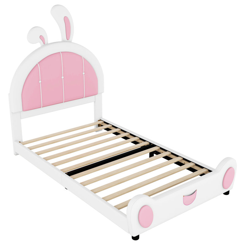 Lit plateforme tapissier avec tête de lit en forme de lapin