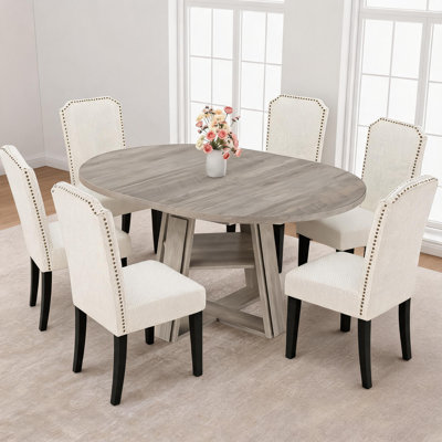Ensemble de table de salle à manger extensible ronde à ovale de 110 à 150 cm avec chaises rembourrées en coton et lin, de 4 à 8 places assises.