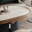 Ensemble de tables basses ovales en pierre frittée et verre rond