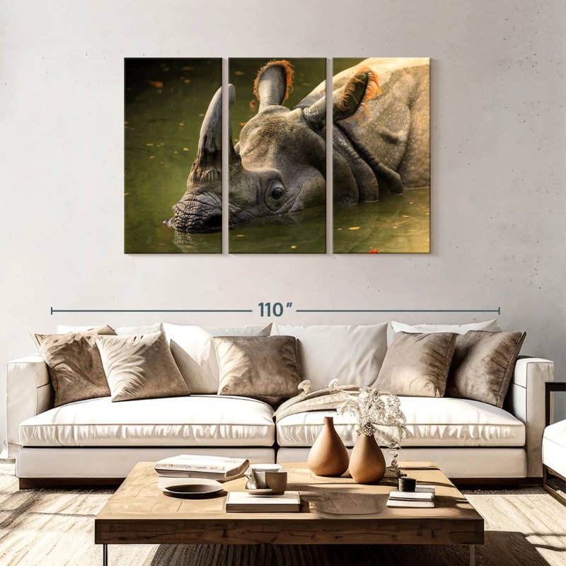 Rhino In Muddy Water