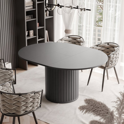 Rushad Extendable Round Dining Table