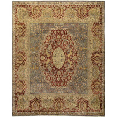 Tapis rouge et multicolore de haute qualité noué à la main