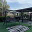 Grande balancelle 3 places avec support avec auvent réglable en PVC, coussins et oreiller inclus, gris-87500009