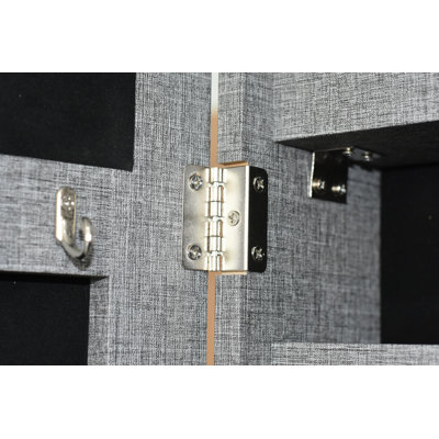 Cette armoire à miroir avec rangement à bijoux Fashion avec lumières DEL peut être accrochée à la porte ou au mur