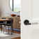 Barcelona Solid Matte Black Door Lever with Satin Silver Knurled Handle