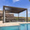 13 pi. L 11 pi. Pergola en aluminium avec abat-jour roulant, 1 côté court